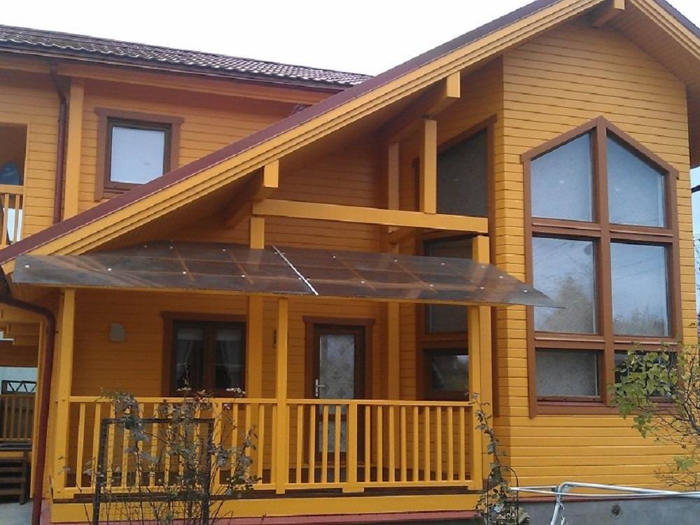 Покраска дома из бруса: внутри, снаружи, клееного, фото